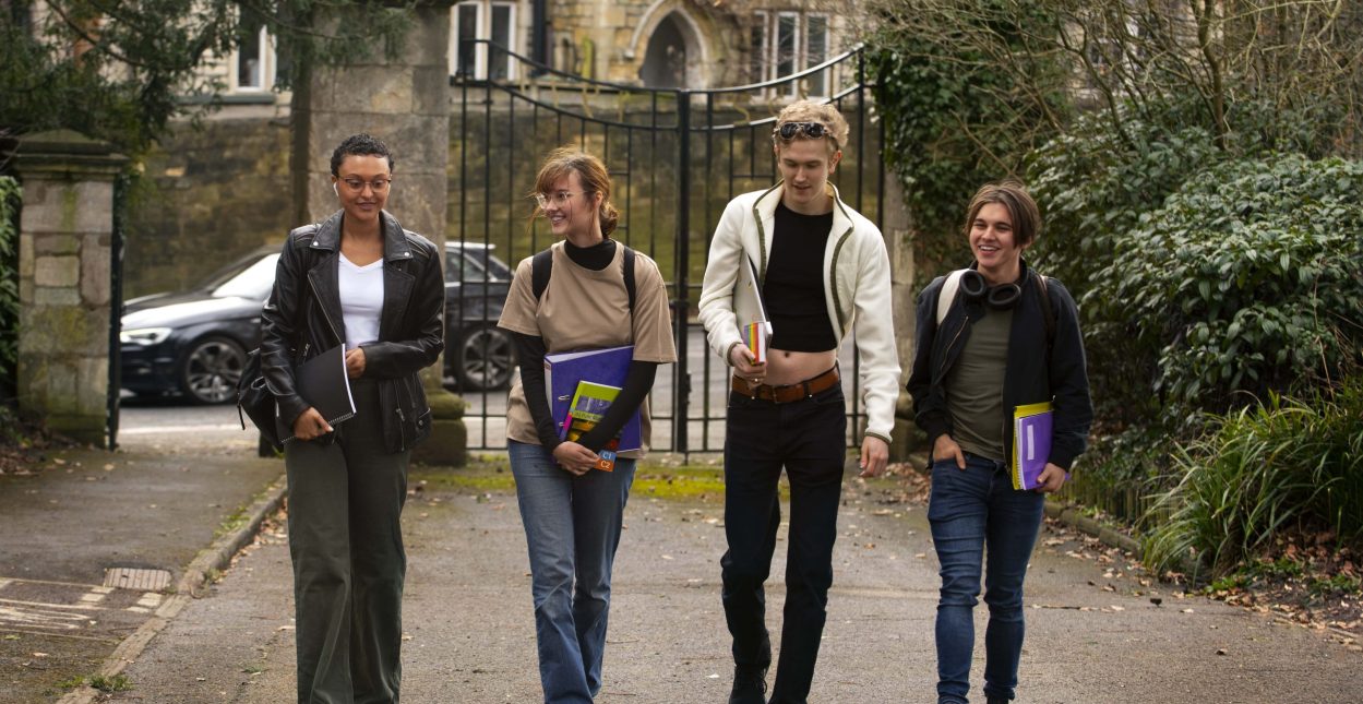 front-view-queer-students-outdoors-min